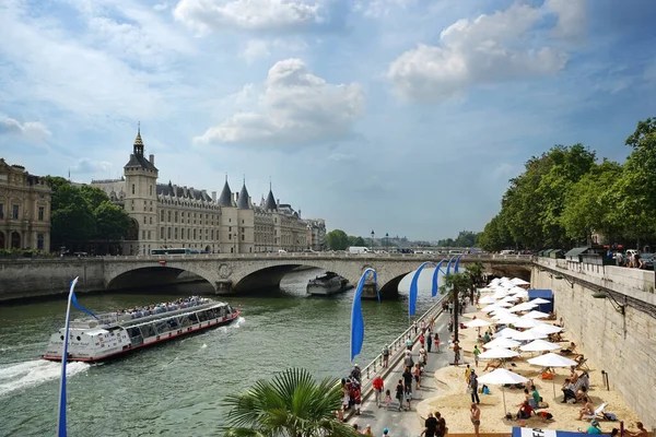 Parisians relax at a Paris Plage. 